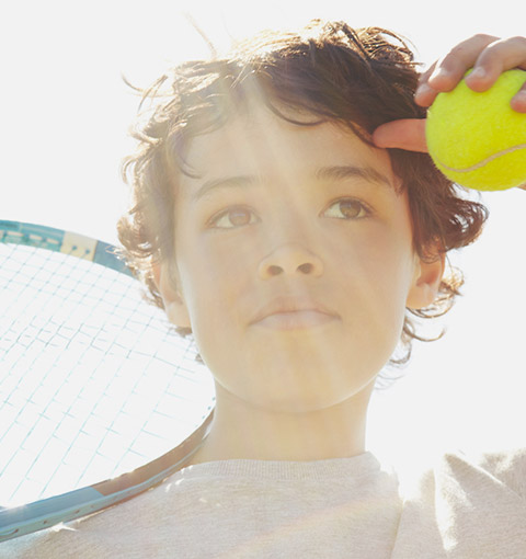 Girl with tennis racket